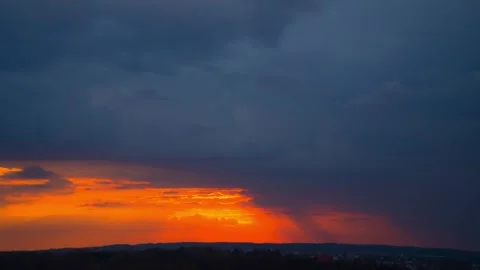 Sunset and dramatic rain clouds, timelapse Stock Footage 333959710