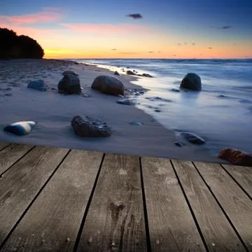 Sunset and empty wooden deck table. ready for product montage display. 写真素材
