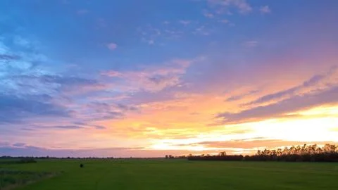 Sunset and farm Stock Photos