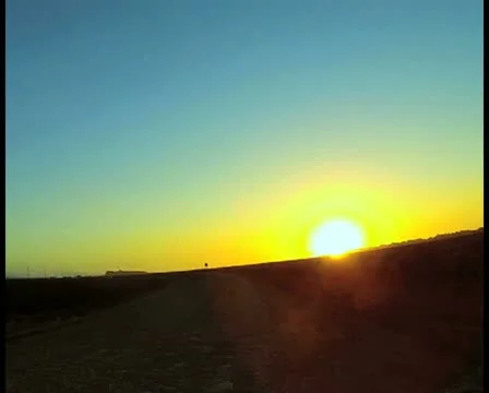 Sunset and field - PAL Stock Footage 12459044