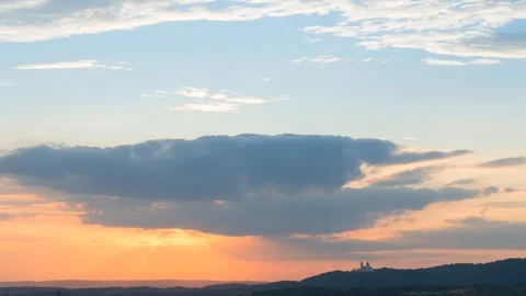 Sunset and flowing clouds - colorful timelapse 库存影片 128176422