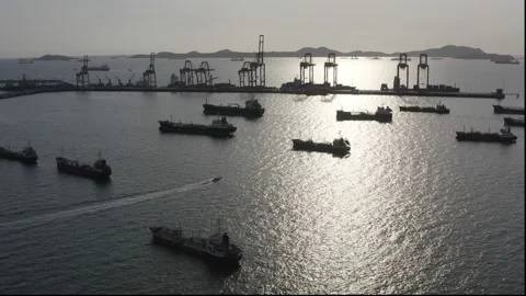 Sunset and fly over tanker ship park in sea, Crude oil tanker and LPG tanker Stock Footage 132019567