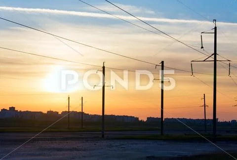 Sunset and high-voltage line Stock Photos