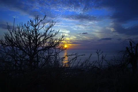 Sunset and its reflection on the sea Stock Photos