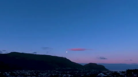Sunset and moon rise over mountains time lapse 스톡 동영상 154410125