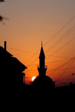 Sunset and mosque Stock Photos