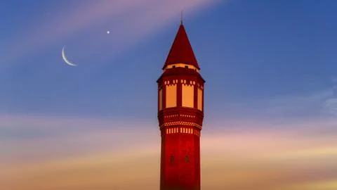 Sunset and new moon Stock Photos
