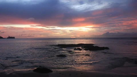 Sunset and night descending at Tip of Broneo in Sabah, Malaysia. 스톡 동영상 136988133