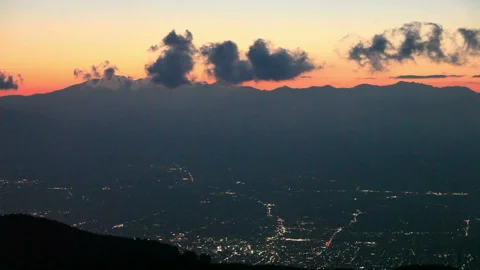 Sunset and Night View of Mount Norikura and Matsumoto City Stock Footage 324911293