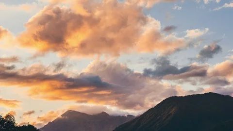 Sunset and nightfall in the mountains. Timelaps video  Stock Footage 127944340