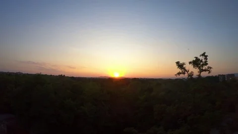 Sunset and nightfall time lapse 4K video with crescent moon rising Stock Footage