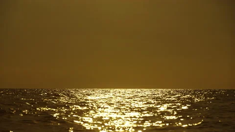 Sunset and orange sky on ocean Stock Footage 212860948