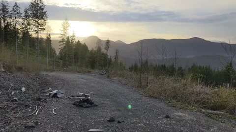 Sunset and pan to snow covered mountains - Nitinat Stock Footage 190842110