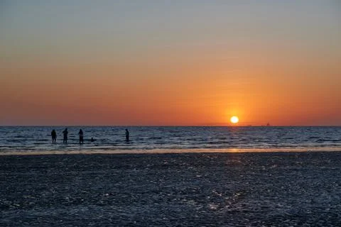 Sunset and people Stock Photos
