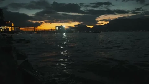 Sunset and pier at beach Stock Footage 150511006