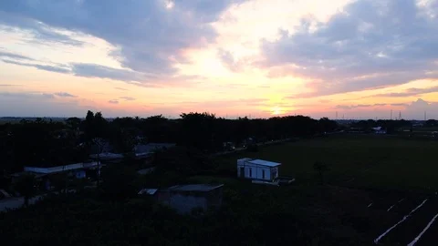 Sunset and rice fields in the countryside at Bekasi, Stock Footage 122919590