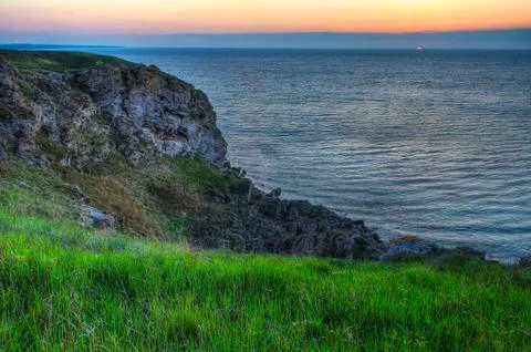 Sunset and rocks Stock Photos