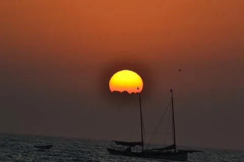 Sunset and Sailboat Foto stock