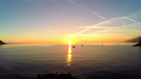 Sunset and Sailing Yachts Stock-Footage 106463927