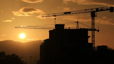 Sunset and silhouette crane working in construction site Vidéo 52024331