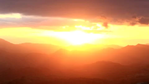 Sunset and silhouette of the mountain Stock Footage 132310289