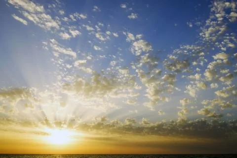 Sunset and sky and clouds in the Mediterranean Sea in Israel Stock Photos