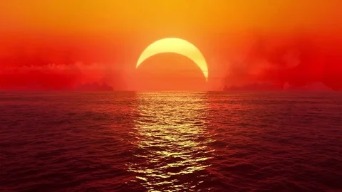 Sunset and solar eclipse over seamlessly looped ocean.  Stock Footage 82273396