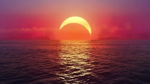 Sunset and solar eclipse over seamlessly looped ocean.  Stock Footage 82274423