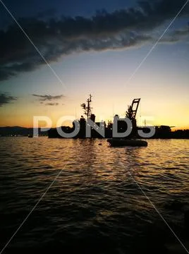 Sunset and submarine Stock Photos
