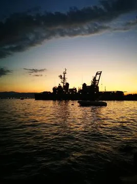 Sunset and submarine Stock Photos