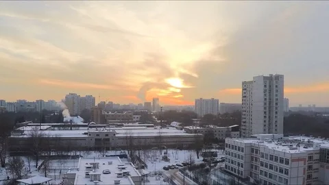 Sunset and sun in winter in town timelapse Stock Footage 79807744