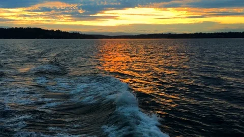 Sunset and wake from Washington State ferry, Seattle. Stock Footage 98008784