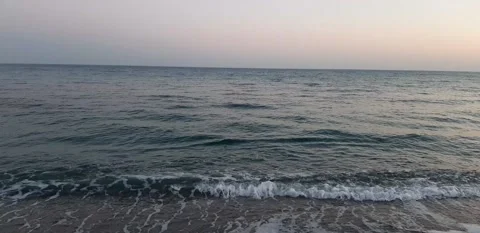 Sunset and waves Stock Footage 132497477