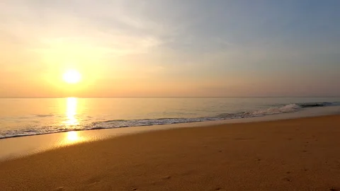 Sunset and waves with golden sand beach and small waves at Phuket Island Stock Footage 327773382