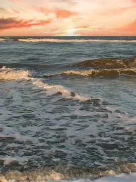 Sunset and waves 写真素材