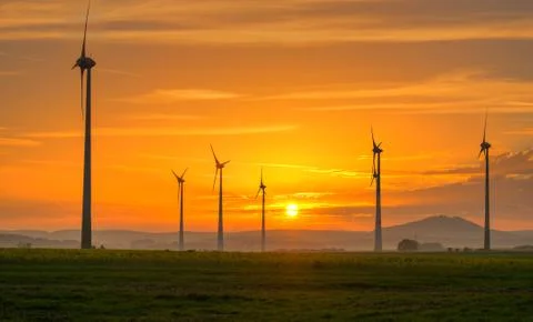 Sunset and wind engines Foto stock
