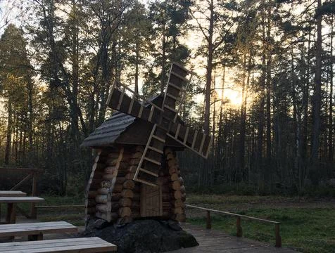 Sunset and the windmill in the park Stock Photos