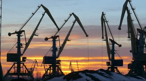 Sunset and working cranes. Stock Footage 59795337