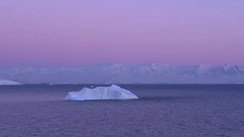 Sunset in Antarctica Epic Vibrant Pink Purple Sky Against Iceberg, Snow Cov.. Stock Footage 340305310
