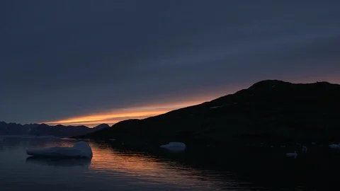Sunset on the Arctic Ocean and his mountains, Greenland Video stock 103604625