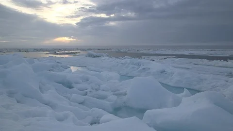Sunset on the Arctic Ocean and the ice floe, North Pole Stock Footage 104925576