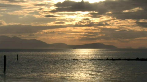 Sunset With Arran And Distant Ferry Scotland Stock Footage 244934