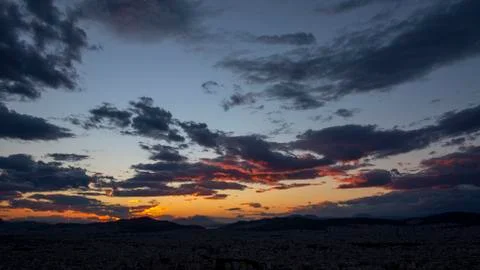 Sunset in Athens with beautiful clouds Stockfoto's