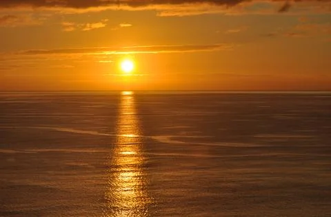 Sunset at the Atlantic, dramatic cloud atmosphere 写真素材