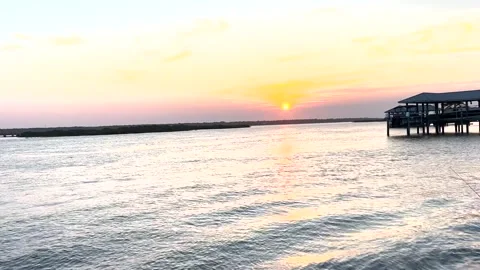 Sunset Atlantic Ocean inlet St. Augustine, Florida Stock Footage 243520235