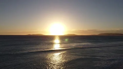 Sunset in Australia beach, mountains at the back, golden hour Stock Footage 172530703