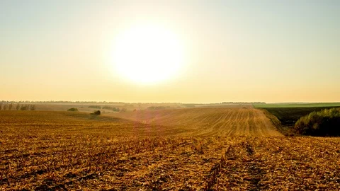 Sunset on autumn corn field. Time Lapse Stock Footage 97299398