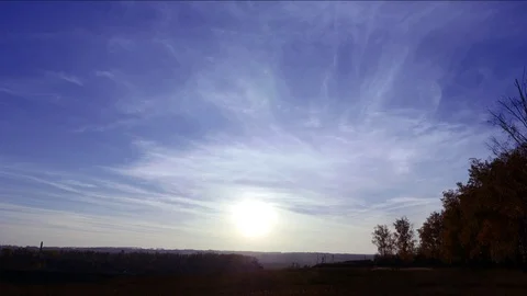 Sunset on the background of the autumn forest. timelapse Stock Footage 97242749
