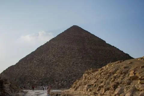 Sunset on the background of the Egyptian pyramids Stock Photos