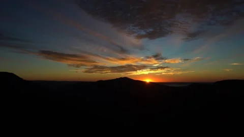 A sunset in the background Stock Footage 155583415